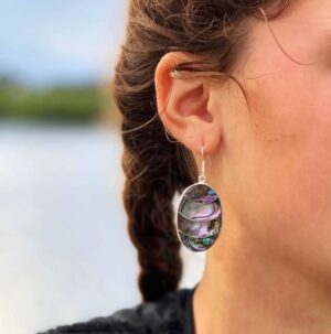 Model with abolone earring