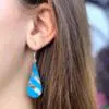 Earrings worn by model