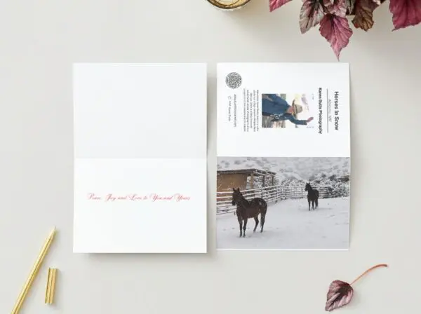 Horses in snow holiday greeting card